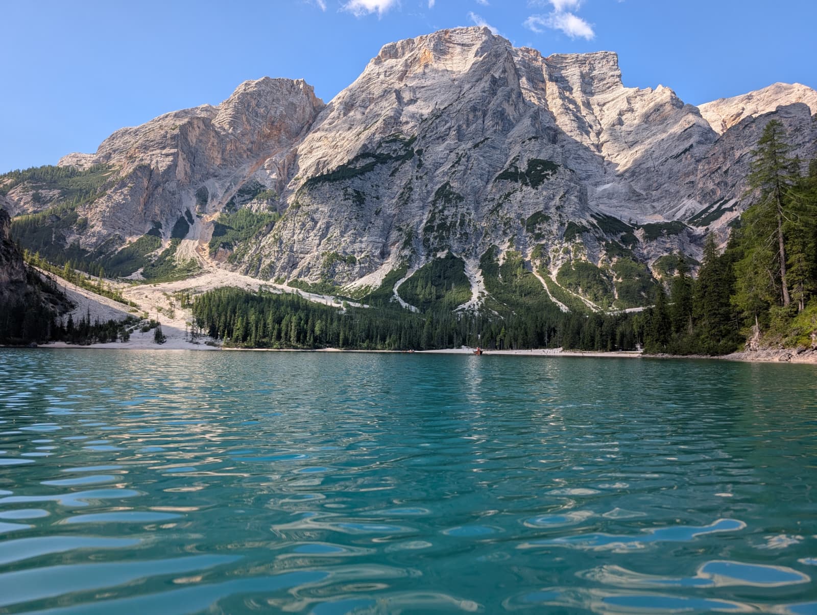 Lago di Braies beneath its surrounding mountain wall