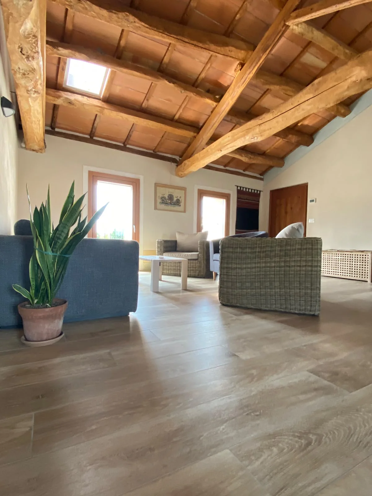 Common lounge beneath the restored timber ceiling